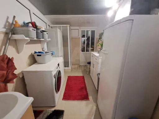 Partially Renovated 2-Bedroom Apartment in Turquel with Garage and Elevator