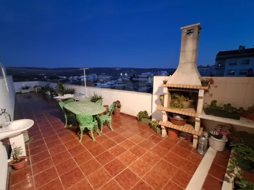Partially Renovated 2-Bedroom Apartment in Turquel with Garage and Elevator