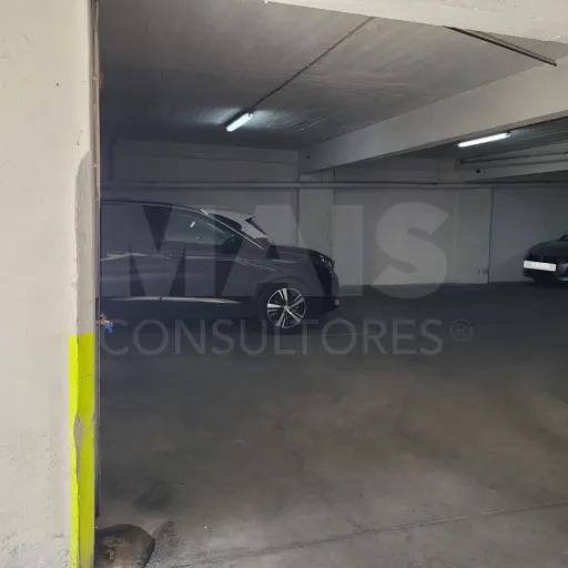 Covered parking space and storage room
