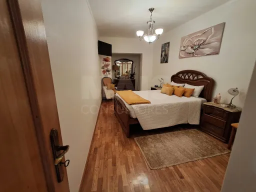 Partially Renovated 2-Bedroom Apartment in Turquel with Garage and Elevator