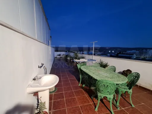 Partially Renovated 2-Bedroom Apartment in Turquel with Garage and Elevator
