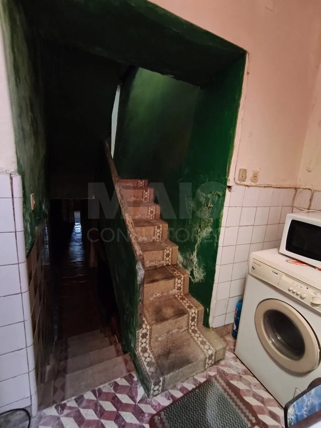 Moradia com garagem para reconstrução centro de Sacavém