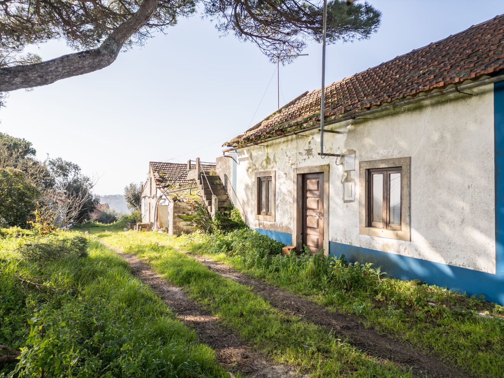 Oportunidade Única | Moradia com Terreno, Vista Aberta e Potencial de Valorização