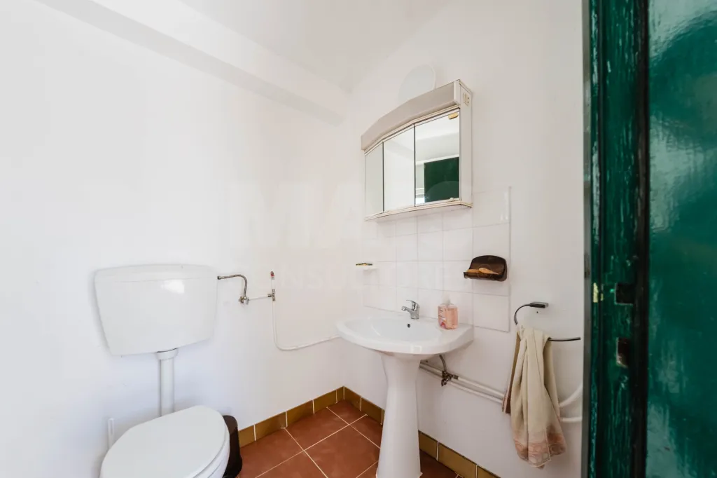Moradia com charme e privacidade inserida em lote de 1400m²