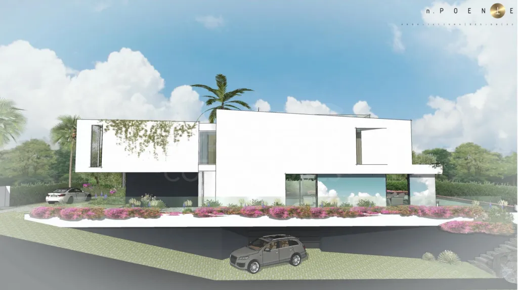 Lote de terreno urbano com 912m2 com projeto para construção de moradia unifamiliar T4 de 390m2 com piscina e vista mar.